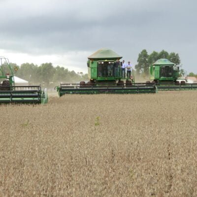 Green Farm Tractor on Brown Field