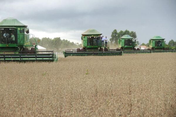 Green Farm Tractor on Brown Field